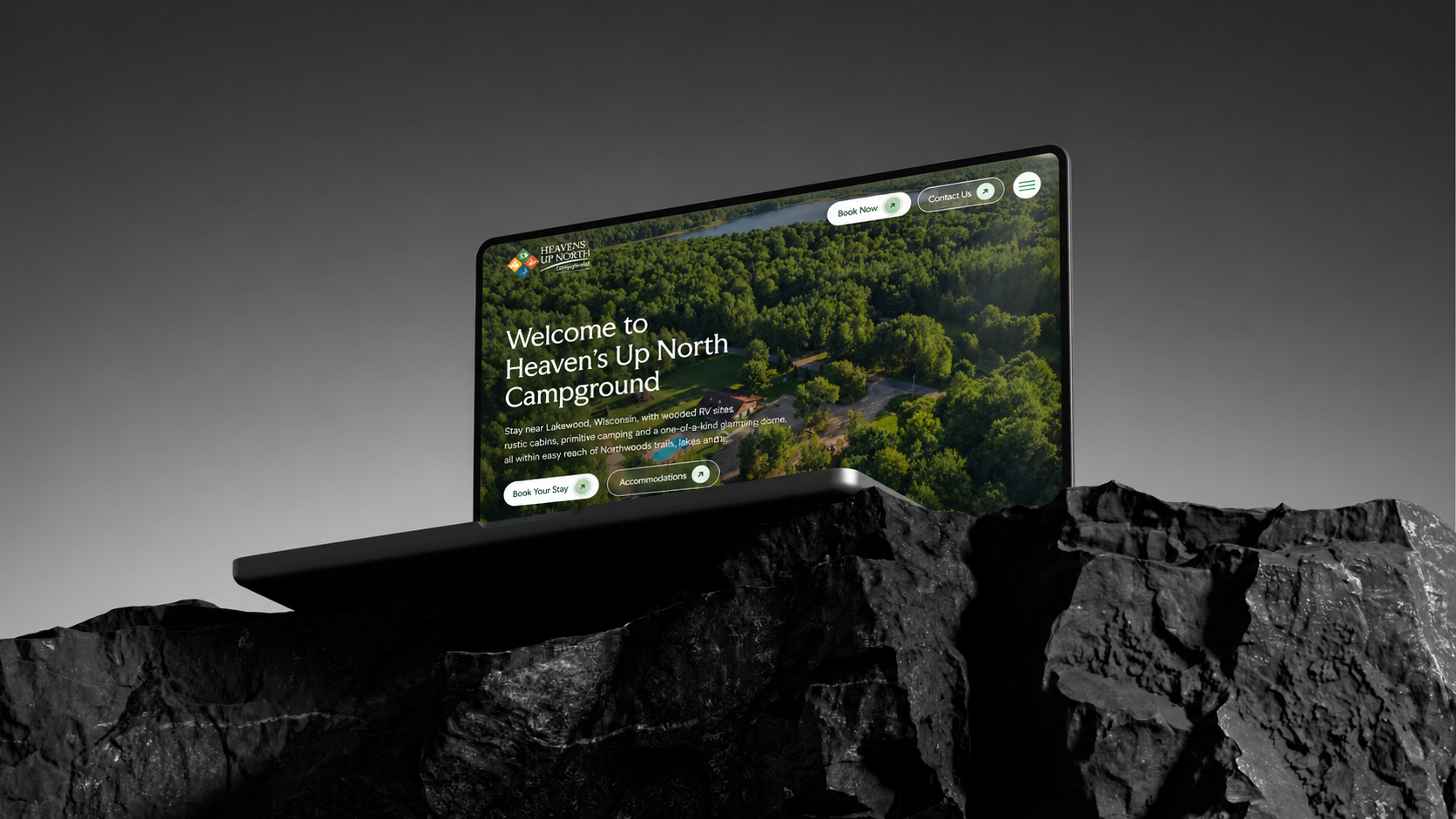 Heaven’s Up North Campground website on a laptop